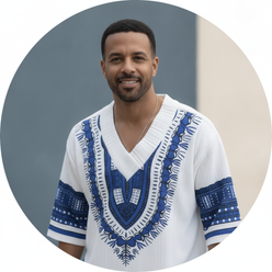 Circular portrait of Marcus Thompson, a man with short dark hair and a warm smile, wearing a patterned V-neck top.